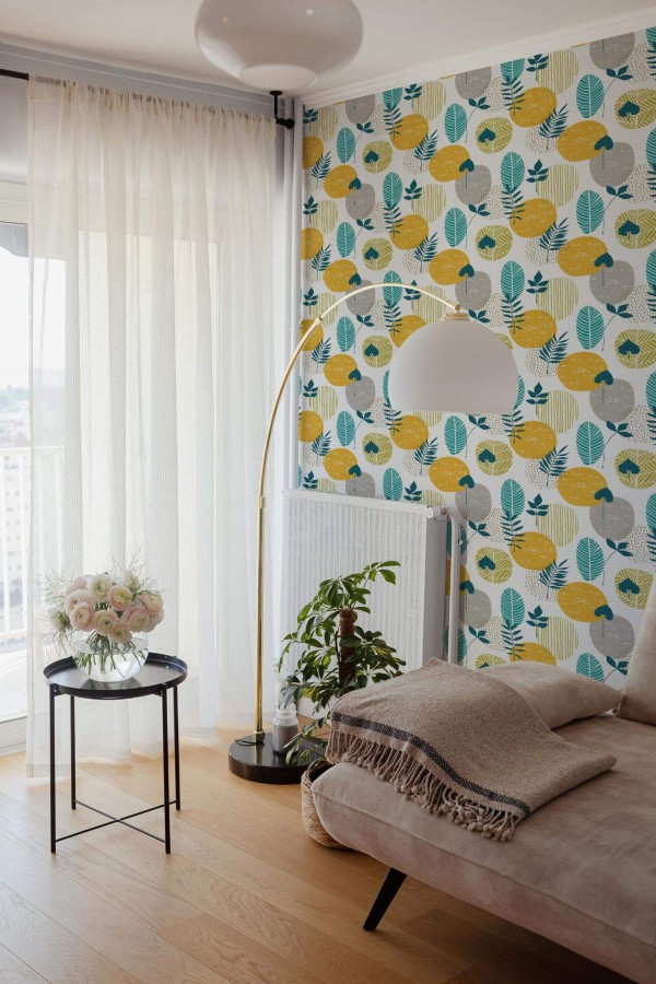 Bohemian Scandinavian style living room decorated with Autumn leaves peel and stick wallpaper