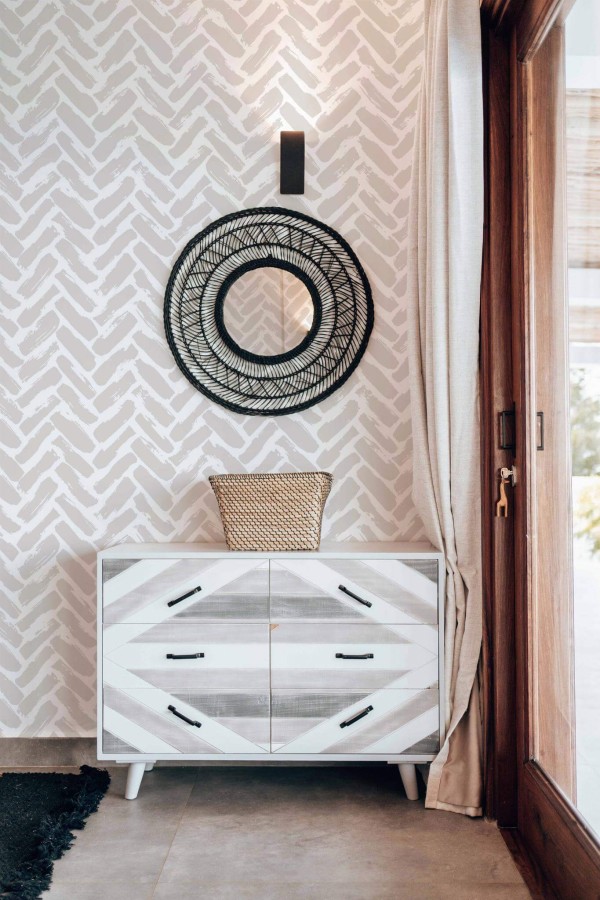 Modern farmhouse style living room decorated with Beige Brush stroke herringbone peel and stick wallpaper