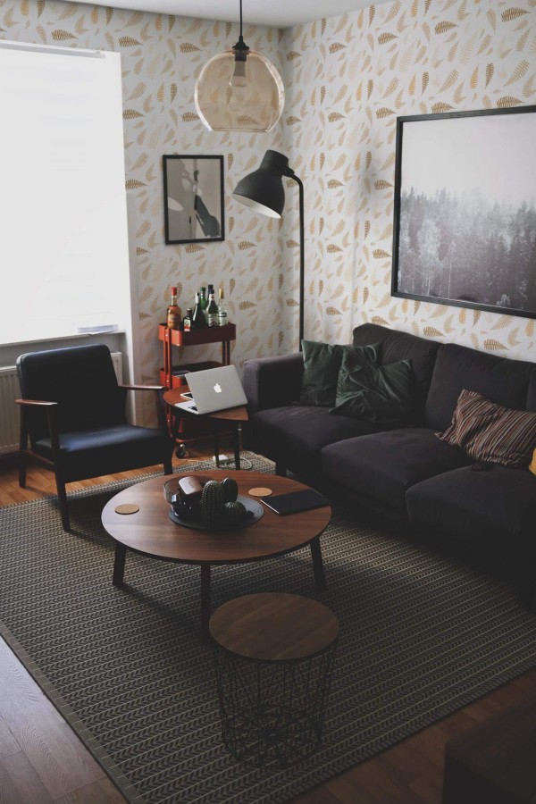 Modern dark industrial style living room decorated with Beige fern leaf peel and stick wallpaper