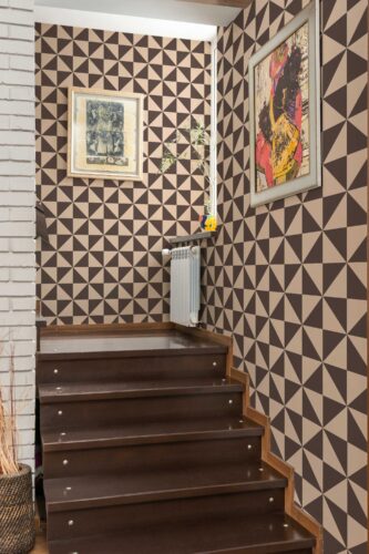 Brown triangles Fancy Walls Peel and stick wallpaper
