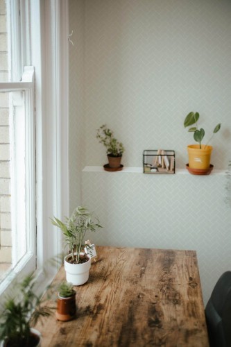Farmhouse style home office decorated with Beige herringbone peel and stick wallpaper