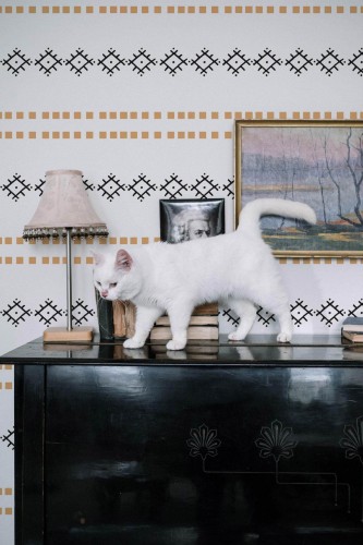 Industrial style music room decorated with Black and beige scandi peel and stick wallpaper