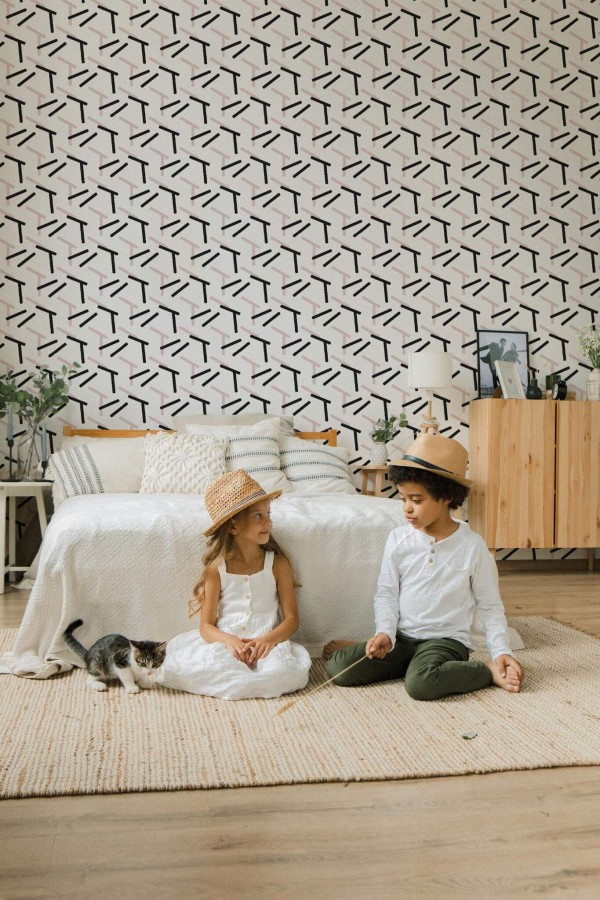 Scandinavian style bedroom decorated with Black and pink shapes peel and stick wallpaper