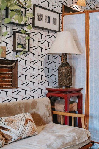 Southwestern style living room decorated with Black and pink shapes peel and stick wallpaper