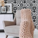 Boho style living room decorated with Black and white tile peel and stick wallpaper