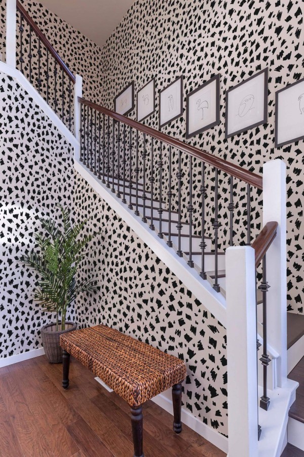 Rustic style entryway decorated with Black hand drawn spots peel and stick wallpaper