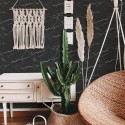 Bohemian style living room decorated with Black Marble peel and stick wallpaper