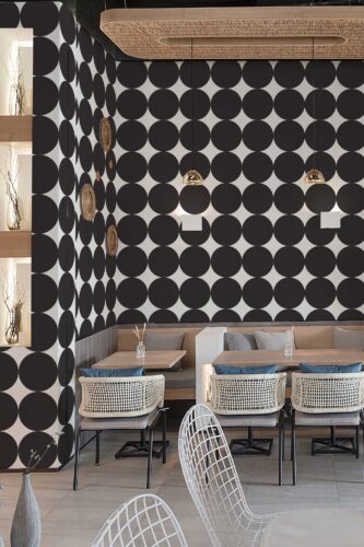 Removable wallpaper with black and white polka dots from Fancy Walls. Bold Dot peel and stick or non-pasted modern wallpaper for walls