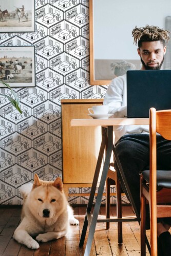 Fancy Walls peel and stick wallpaper with isometric black and white office pattern