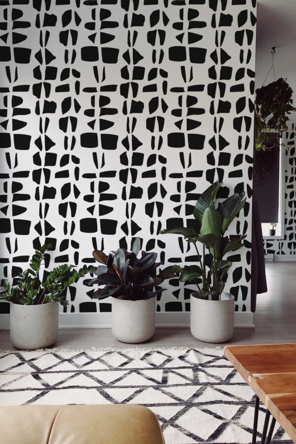 Fancy Walls peel and stick wallpaper with bold black and white Raw Form stone pattern