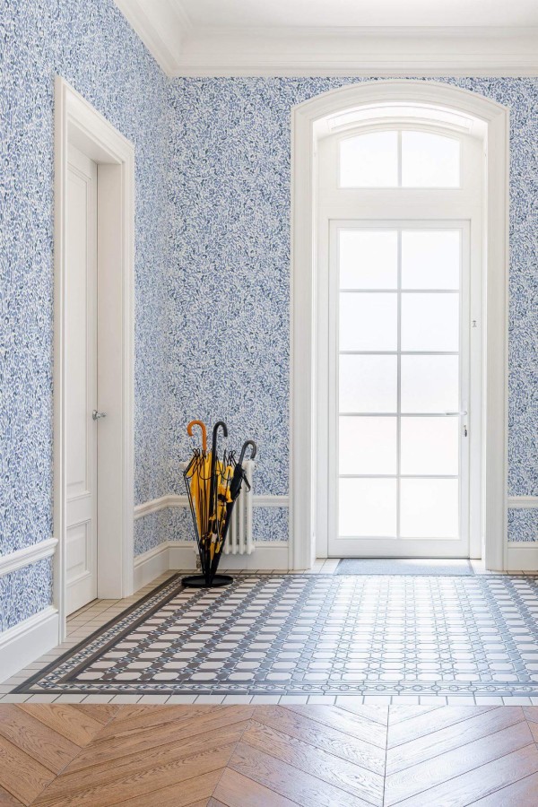 Minimal farmhouse style entryway decorated with Blue abstract peel and stick wallpaper