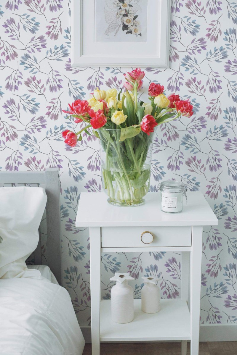 Farmhouse style bedroom decorated with Blue and purple leaf peel and stick wallpaper