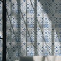 Scandinavian style living room decorated with Blue Mediterranean Tile peel and stick wallpaper