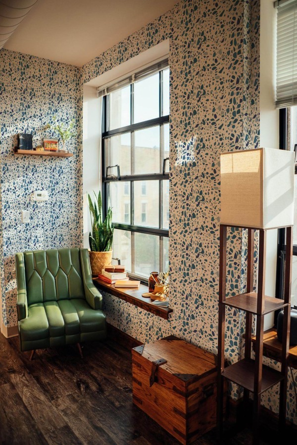 Mid-century style living room decorated with Blue terrazzo peel and stick wallpaper