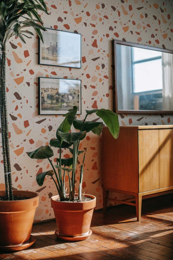 Mid-century modern style living room decorated with Brown terrazzo peel and stick wallpaper