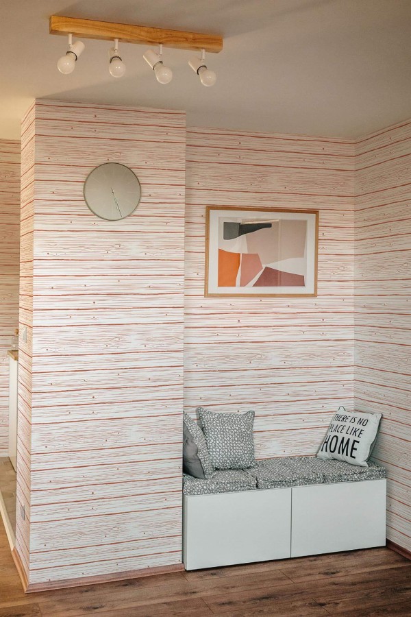 Scandinavian style entryway decorated with Brown wood pattern peel and stick wallpaper
