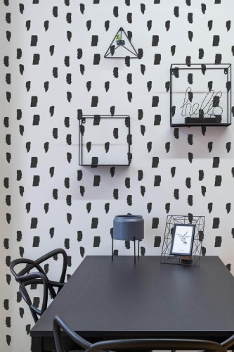 Industrial modern style dining room decorated with Brush stroke dotted peel and stick wallpaper