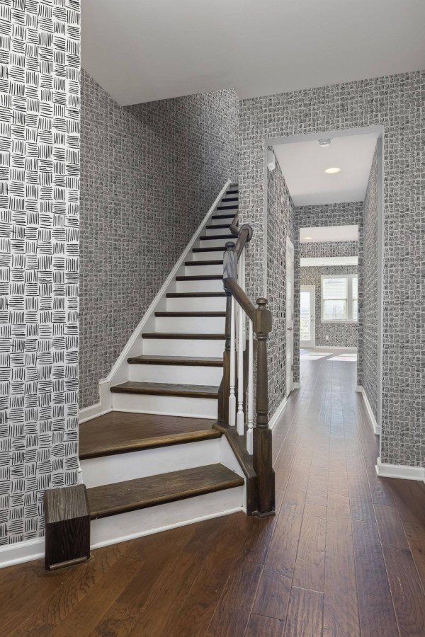 Rustic style hallway decorated with Brush stroke lines peel and stick wallpaper
