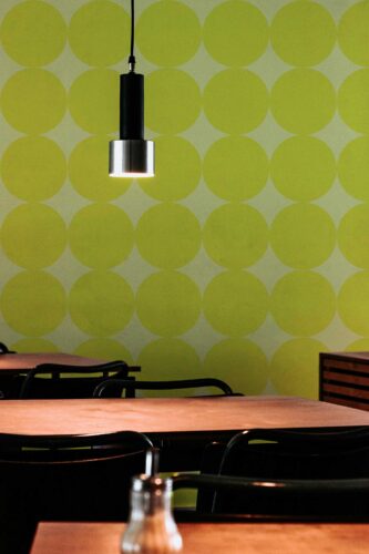 Traditional wallpaper with chartreuse circles by Fancy Walls
