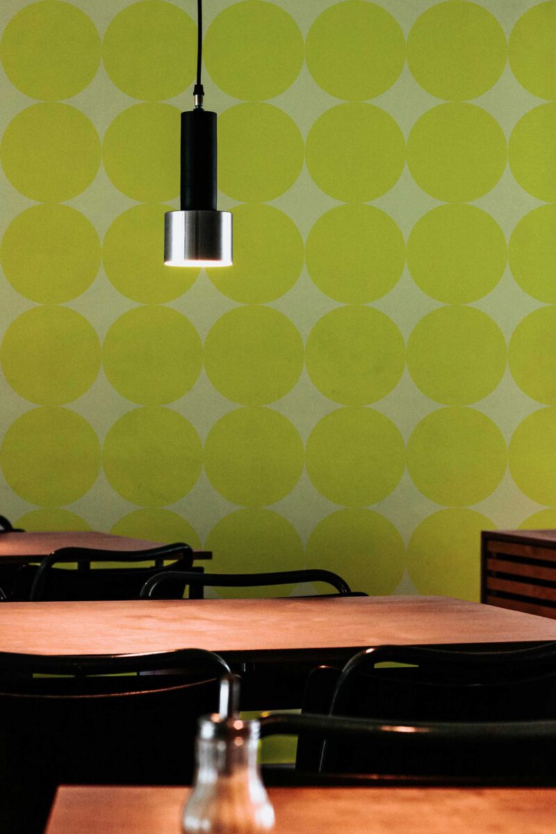 Traditional wallpaper with chartreuse circles by Fancy Walls