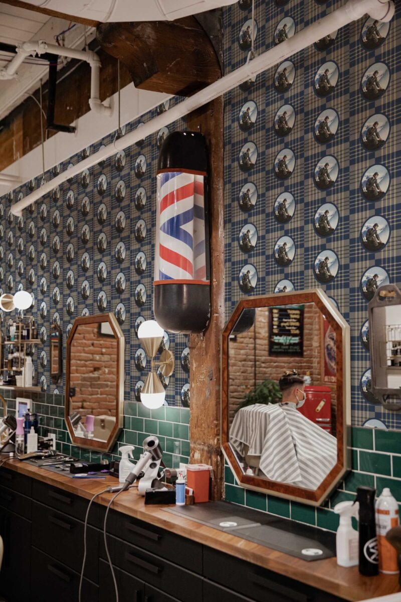 Peel and stick wallpaper with brown plaid Sherlock print by Fancy Walls