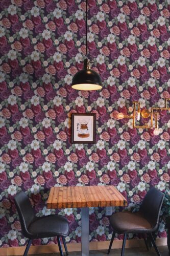 Fancy Walls removable wallpaper featuring lush colorful roses and leaves