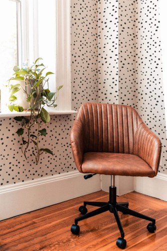 Mid-century modern style living room decorated with Dalmatian peel and stick wallpaper