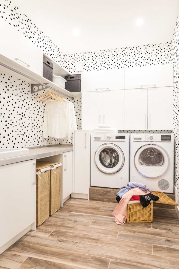 Fancy Walls removable wallpaper featuring black polka dots on white