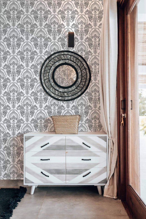 Modern farmhouse style living room decorated with Damask peel and stick wallpaper