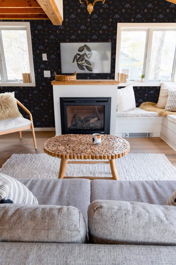 Farmhouse boho style living room decorated with Dark blue floral peel and stick wallpaper