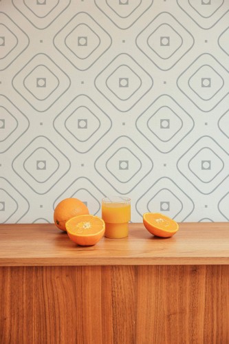 Mid-century style living room decorated with Delicate geometric peel and stick wallpaper