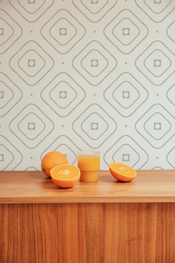 Mid-century style living room decorated with Delicate geometric peel and stick wallpaper