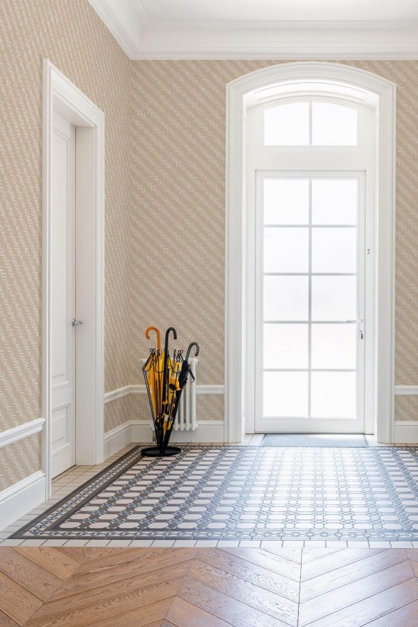 Minimal farmhouse style entryway decorated with Diagonal arrows peel and stick wallpaper