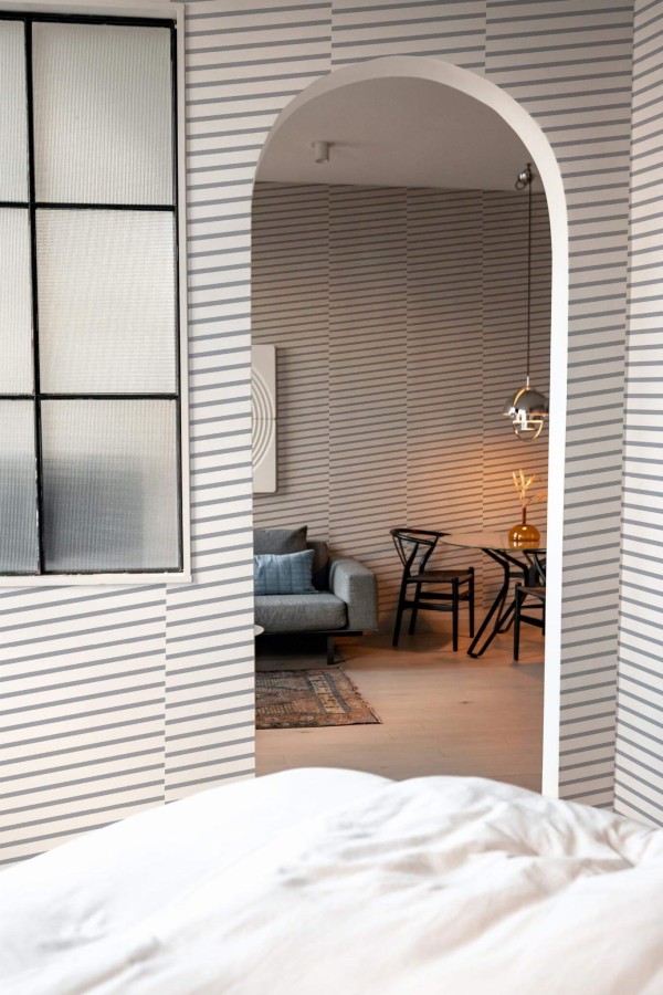Modern scandinavian style living room decorated with Diagonal Line peel and stick wallpaper