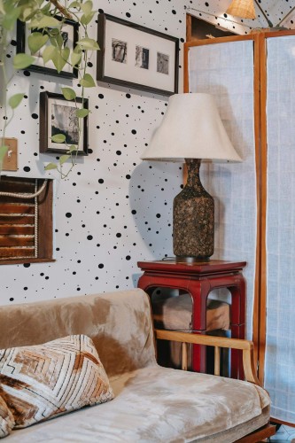 Southwestern style living room decorated with Dots peel and stick wallpaper