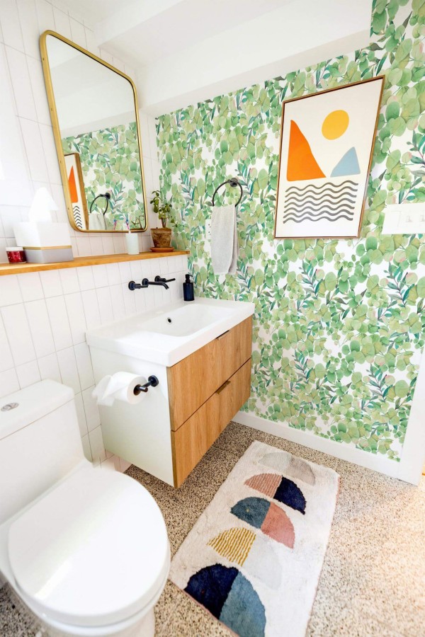Modern boho style coffee bar decorated with Eucalyptus leaf peel and stick wallpaper