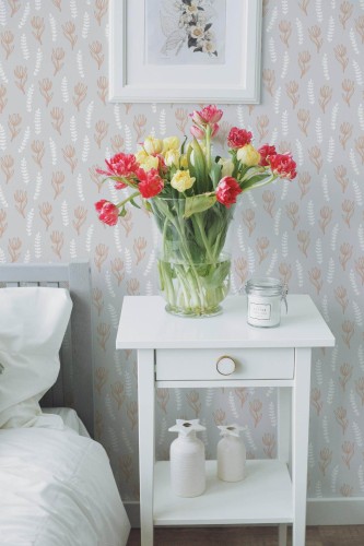 Farmhouse style bedroom decorated with Floral and leaf peel and stick wallpaper