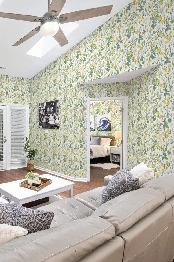 Coastal scandinavian style living room and bedroom decorated with Floral meadow peel and stick wallpaper