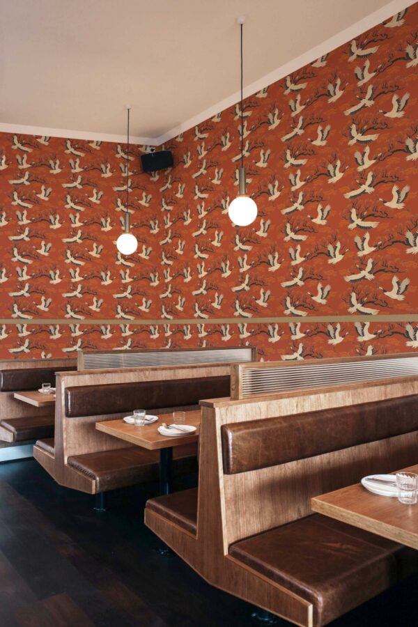 Elegant Flight peel and stick or non-pasted wallpaper for walls. Fancy Walls removable self-adhesive or traditional storks on burnt orange background design PVC-free and eco-friendly wallpaere for bar, cafe, restaurant