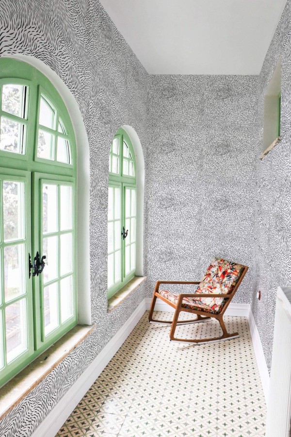 Mediterranean style hallway decorated with Fur peel and stick wallpaper