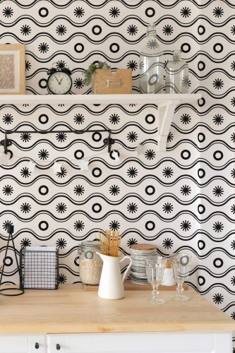 Light farmhouse style kitchen decorated with Geometric boho peel and stick wallpaper
