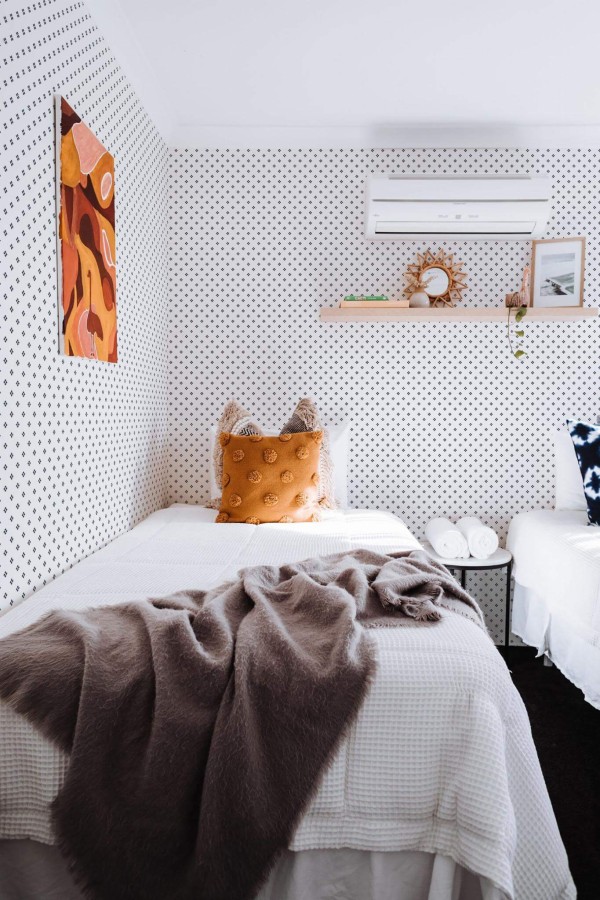 Boho style bedroom decorated with Geometric rhombus Polka Dot peel and stick wallpaper