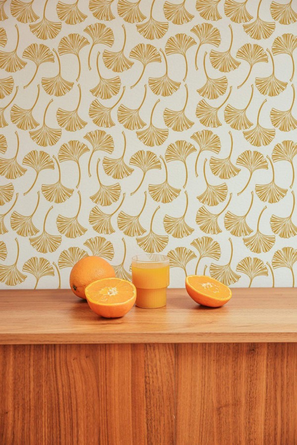 Mid-century style living room decorated with Ginkgo peel and stick wallpaper