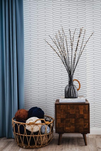 Coastal style living room decorated with Gray and white Herringbone peel and stick wallpaper
