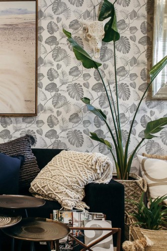 Scandinavian style living room decorated with Gray and white tropical leaf peel and stick wallpaper