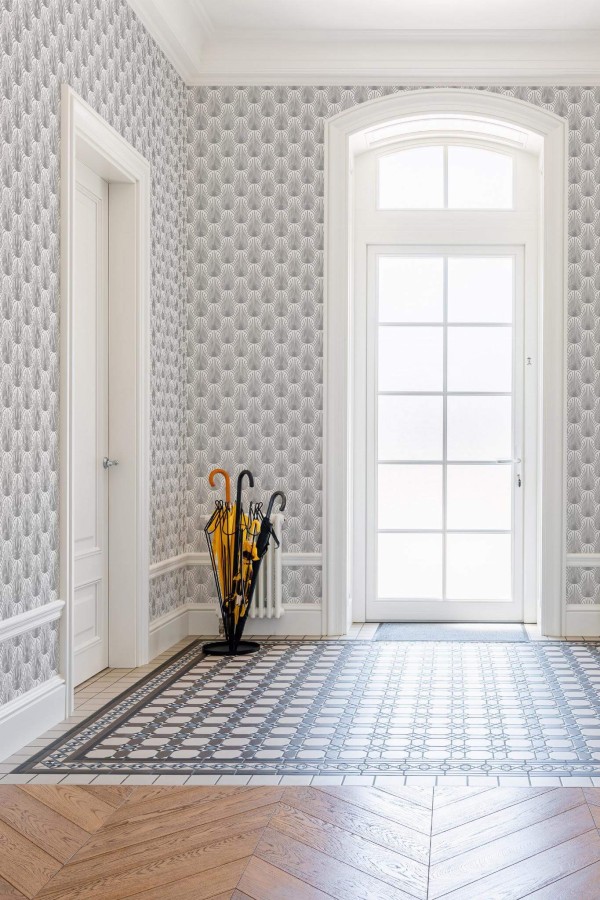 Minimal farmhouse style entryway decorated with Gray Art deco peel and stick wallpaper