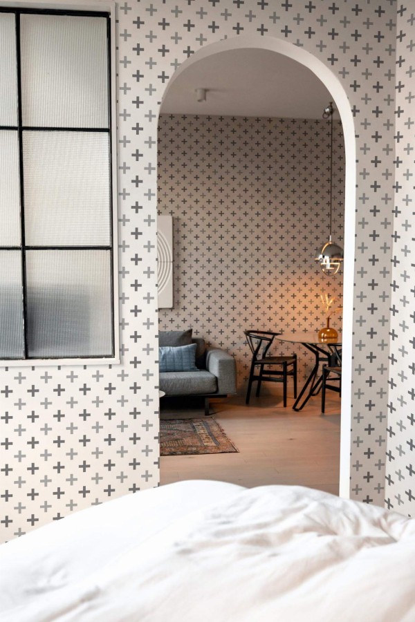 Modern scandinavian style living room decorated with Gray plus sign peel and stick wallpaper