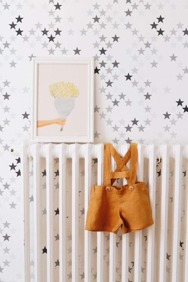 Bohemian style kids room decorated with Gray stars peel and stick wallpaper