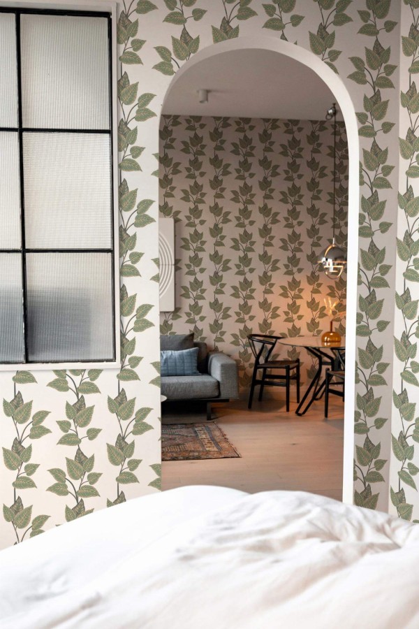 Modern scandinavian style living room decorated with Green and beige leaf peel and stick wallpaper