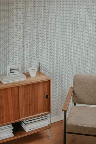 Mid-century style living room decorated with Green and white geometric peel and stick wallpaper